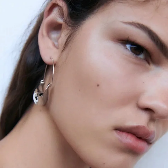 Any 3/$25! Silver Twisted Ribbon Hoop Earrings - Picture 6 of 8